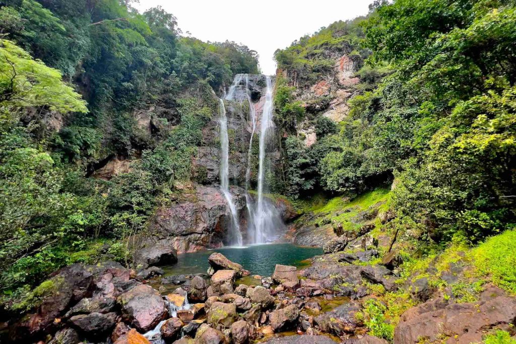 cunca rami waterfall - flores wanderlust