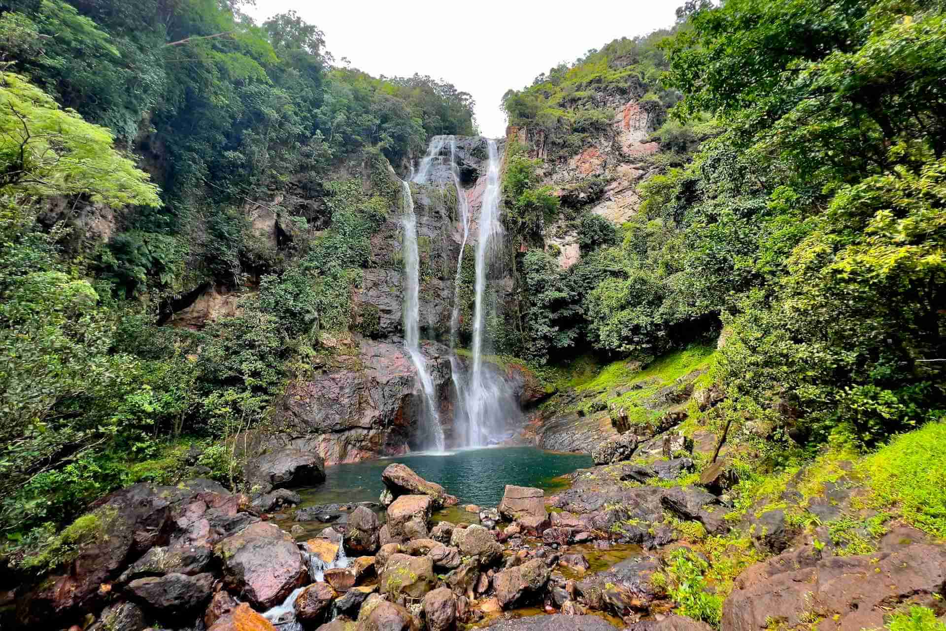 cunca rami waterfall - flores wanderlust